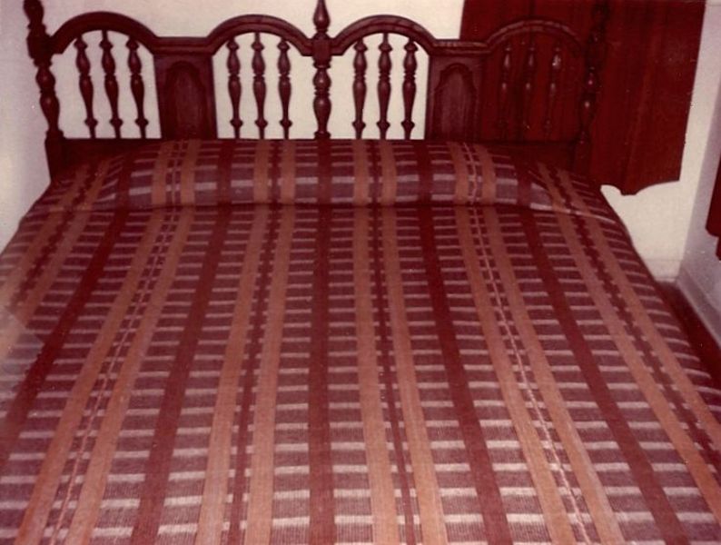 Woven bedspread in Rudi's home